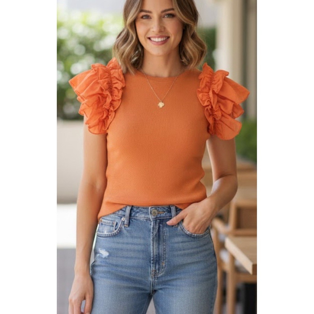 By Anthropologie top with ruffled sleeves, size large, peach color Cotton